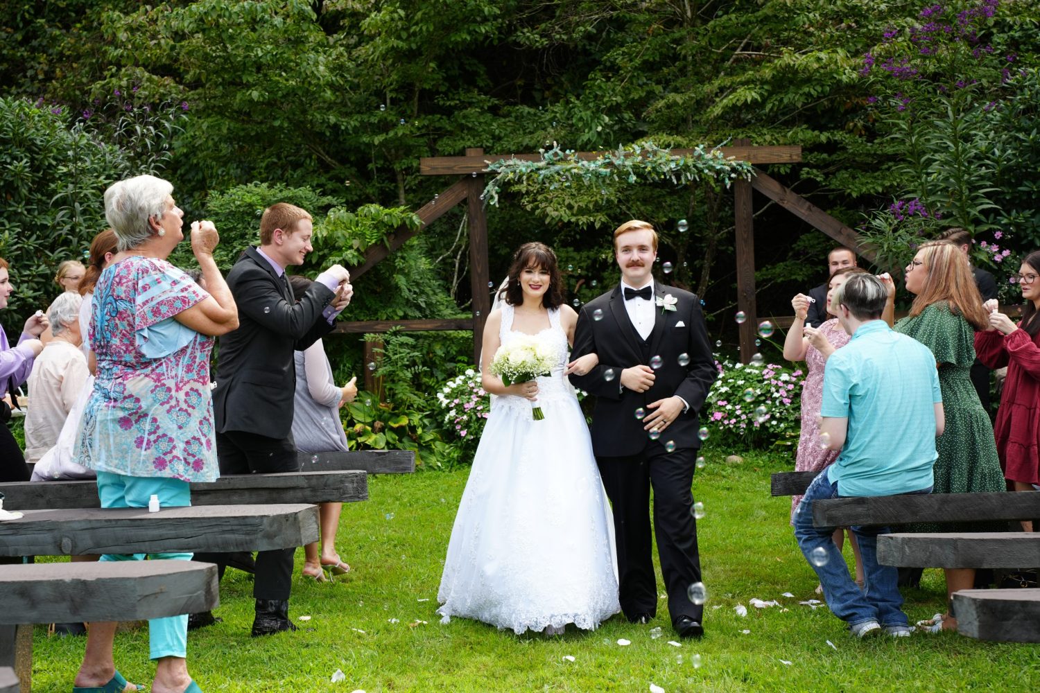 bride-groom-wedding-ceremony-site-creekside